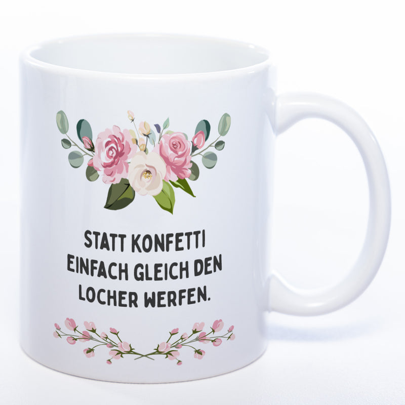 Blümchen-Tasse mit Spruch "Statt Konfetti einfach gleich den Locher werfen." - Lustige Kaffeetasse spülmaschinenfest