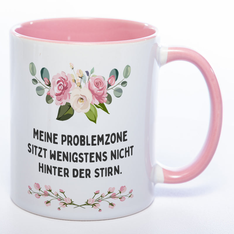 Blümchen-Tasse mit Spruch "Meine Problemzone sitzt wenigstens nicht hinter der Stirn." - Lustige Kaffeetasse spülmaschinenfest