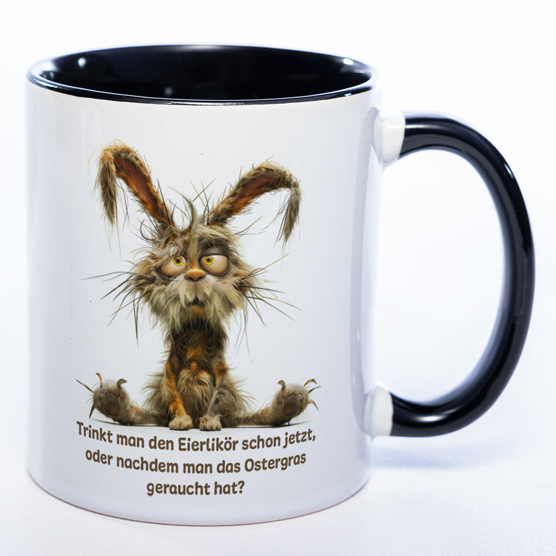 Motiv - Tasse mit Spruch und Hase: Trinkt man den Eierlikör schon jetzt, oder nachdem man das Ostergras geraucht hat? spülmaschinenfest