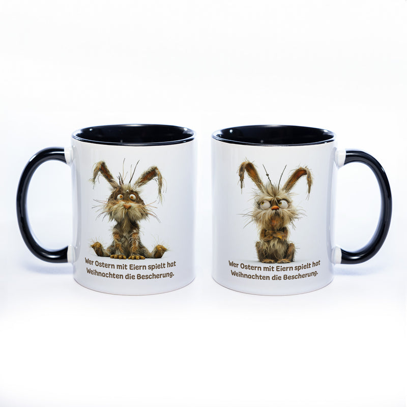 Motiv - Tasse mit Spruch und Hase: Wer Ostern mit Eiern spielt hat Weihnachten die Bescherung.- spülmaschinenfest