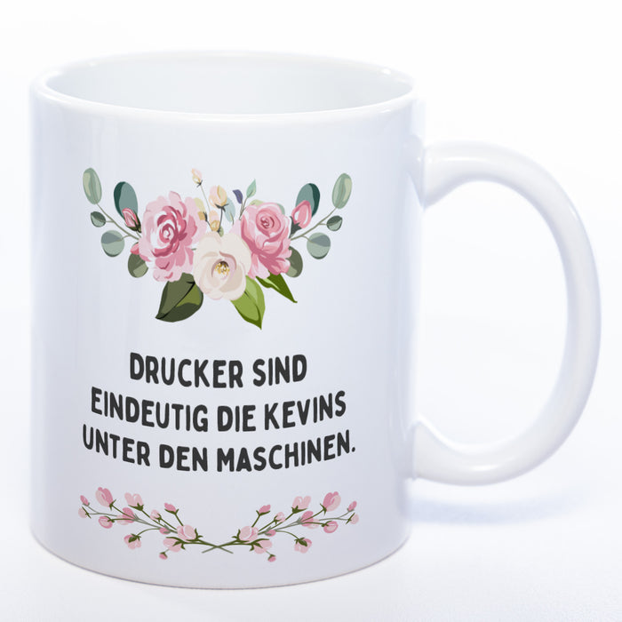 Blümchen-Tasse mit Spruch "Drucker sind eindeutig die Kevins unter den Maschinen." - Lustige Kaffeetasse spülmaschinenfest