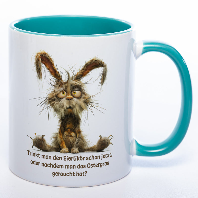 Motiv - Tasse mit Spruch und Hase: Trinkt man den Eierlikör schon jetzt, oder nachdem man das Ostergras geraucht hat? spülmaschinenfest